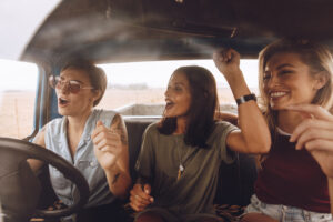 girls jamming to road trip songs in Ireland
