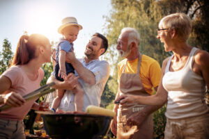 a family around a barbecue