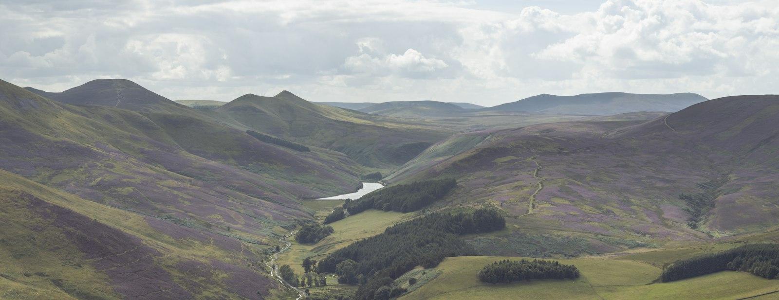 Rolling hills and a valley in the Scottish countryside