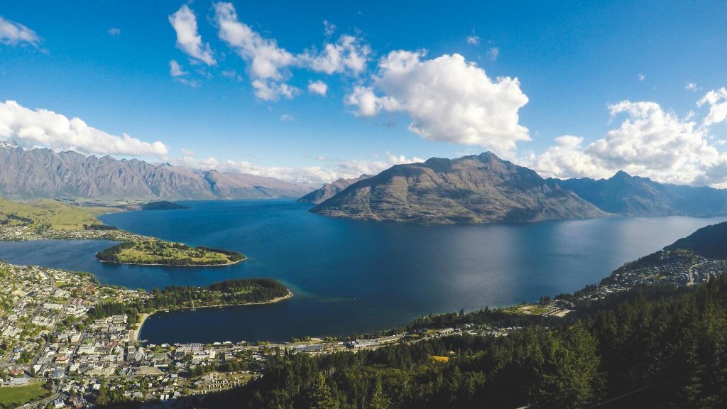 Queenstown and Lake Wakatipu from above on a sunny day
